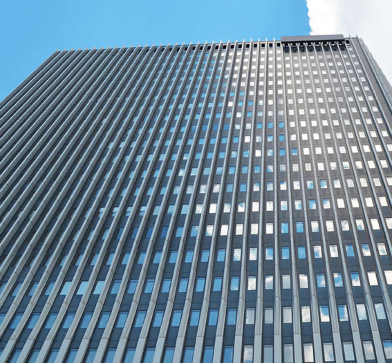 Beautiful skyscraper on sunny day. Modern architectural design